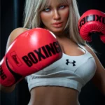 Alizée Sex Doll 164 cm IronTech en tenue de boxe, gants rouges, pose dynamique.