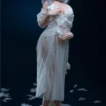 Léona Sex Doll 166 cm IronTech Doll en robe transparente, pose debout élégante.