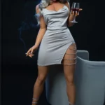 Lollika Sex Doll 164 cm en robe argentée, tenant un verre de vin, pose élégante.