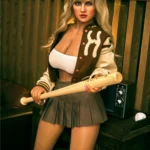 Lulila Sex Doll 165 cm IronTech, posée debout avec veste marron et jupe plissée, tenant une batte.