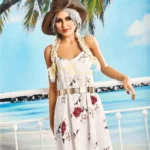 Lullia Valentina, la sex doll en TPE, en robe d'été et chapeau au bord de la plage.